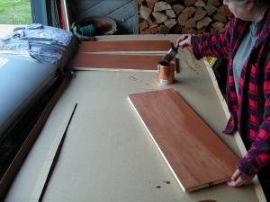 My mom applying a second coat of stain