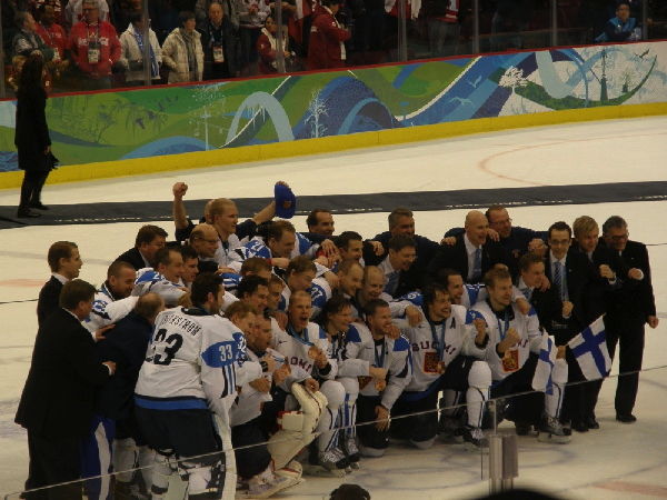 Centre Ice Photo with Bronze Medals