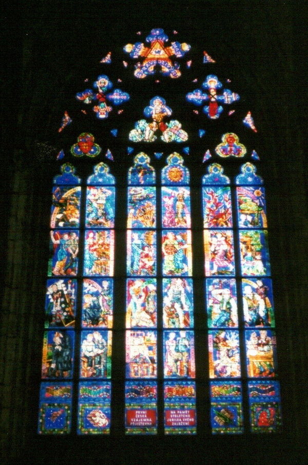 Illuminated window in a church in Prague