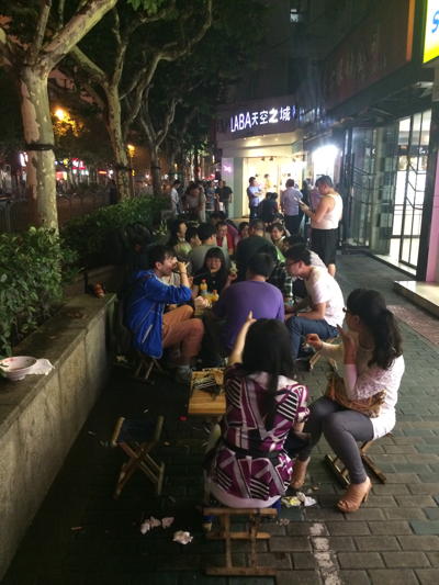 Eating at little tables in the streets was also popular