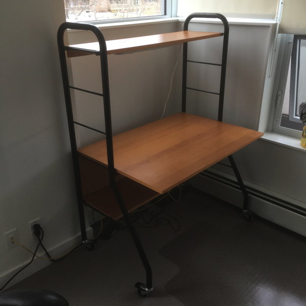 My now twenty year-old Ikea desk has gotten a bit small.