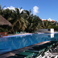A pool at the El Dorado Royale Resort